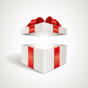 weißes Geschenk mit roter Schleife und geöffnetem Deckel